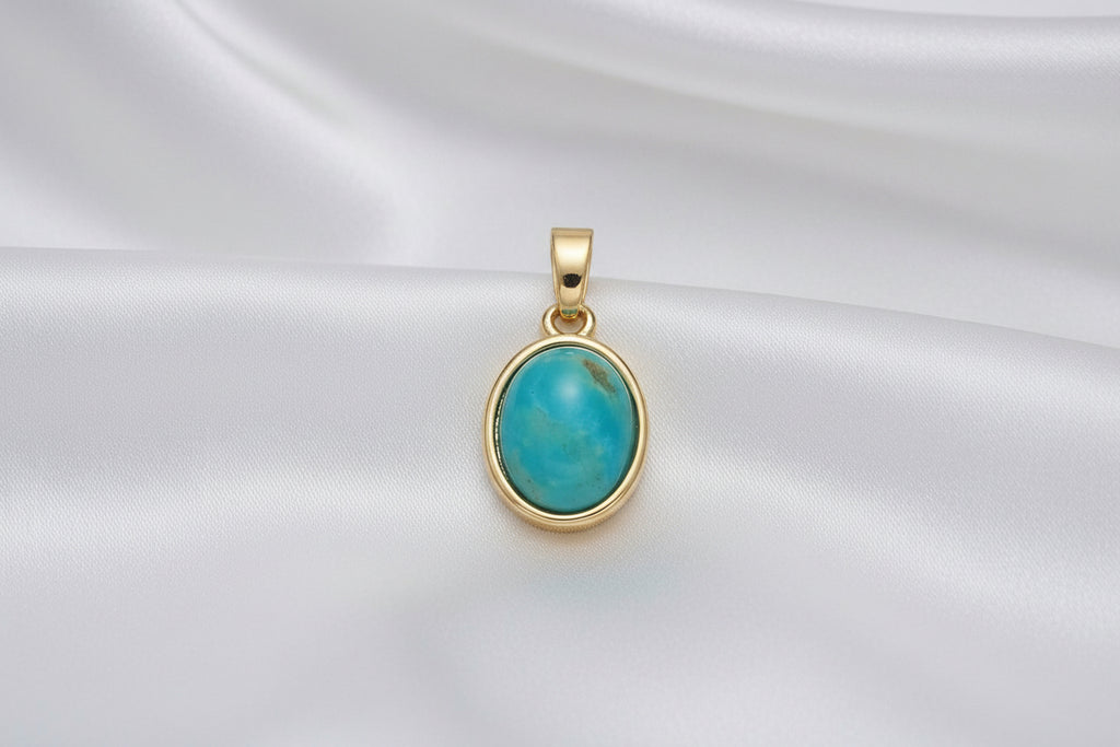 blue stone gold setting with white background