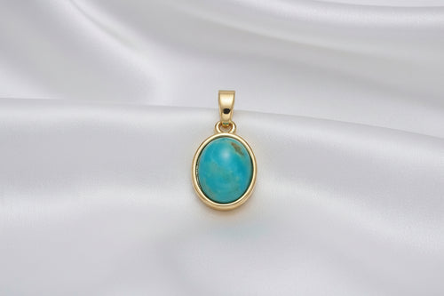 blue stone gold setting with white background