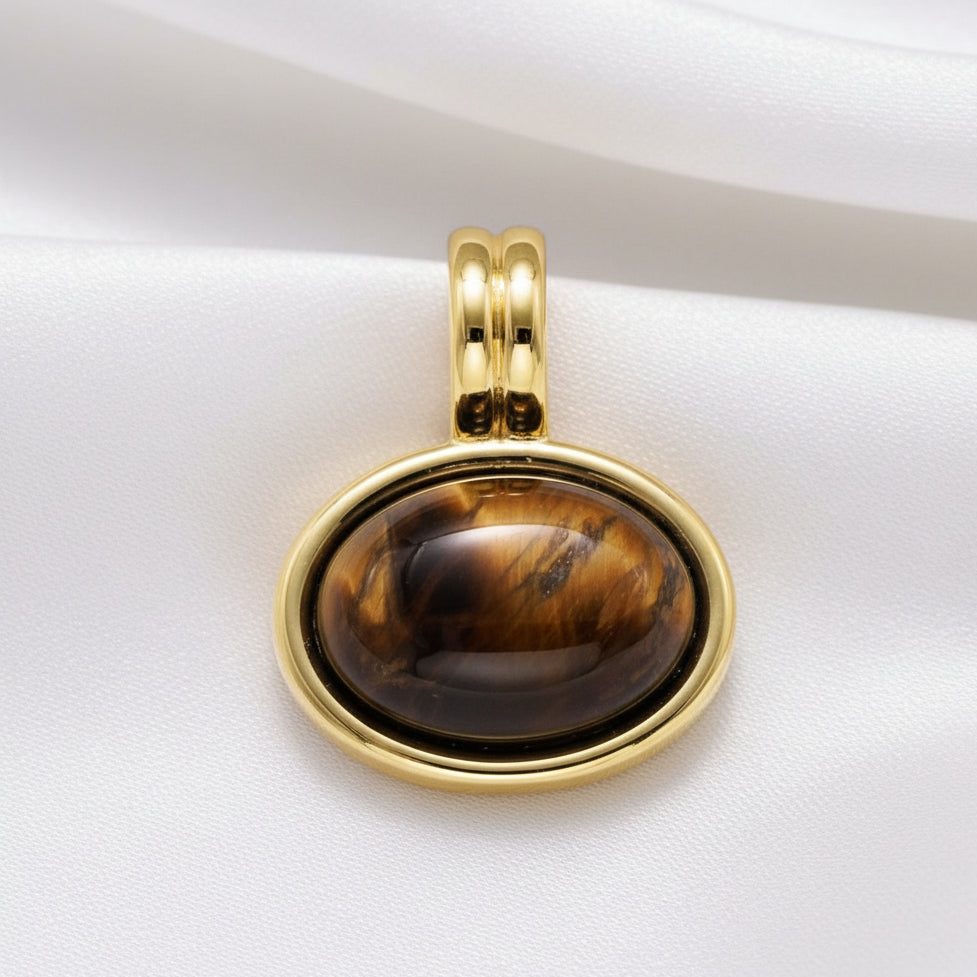 brown stone gold setting with white silky background