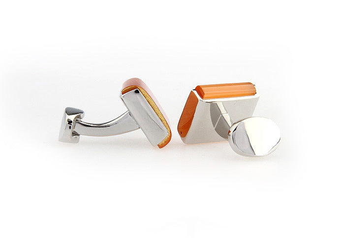 backside of two cufflinks white background