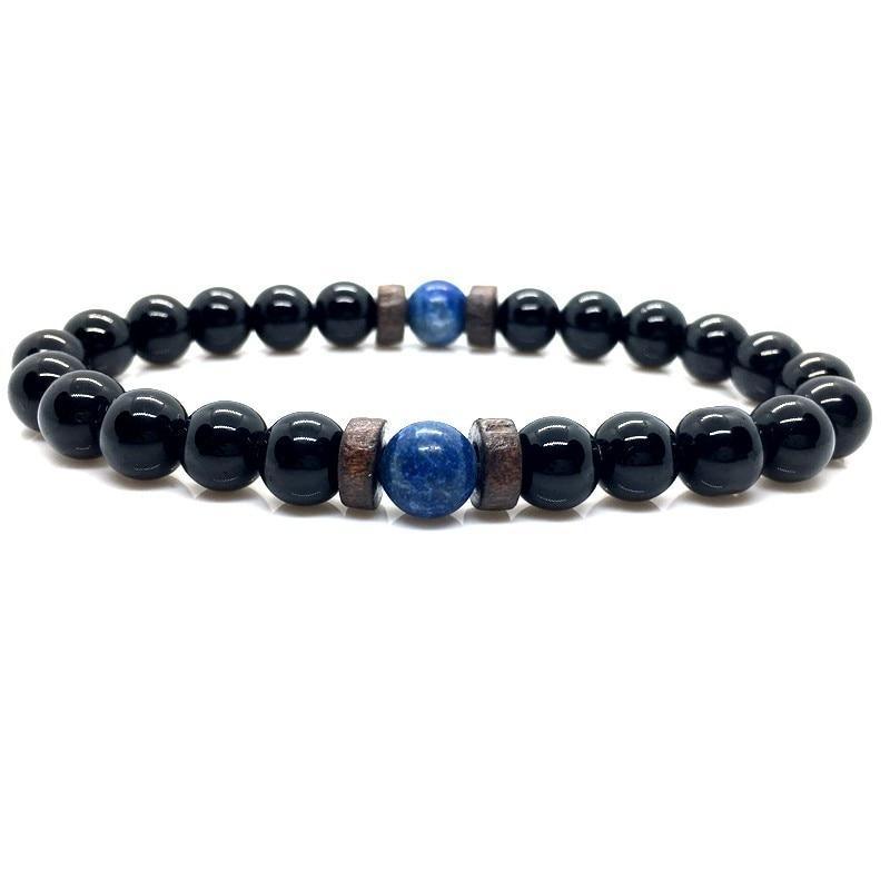 Black beaded bracelet with blue and brown beads on a white background