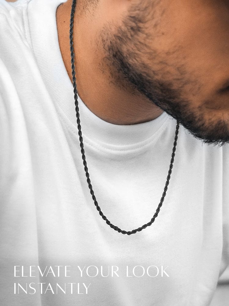 Man wearing a black beaded necklace with text 'Elevate Your Look Instantly' on a white background
