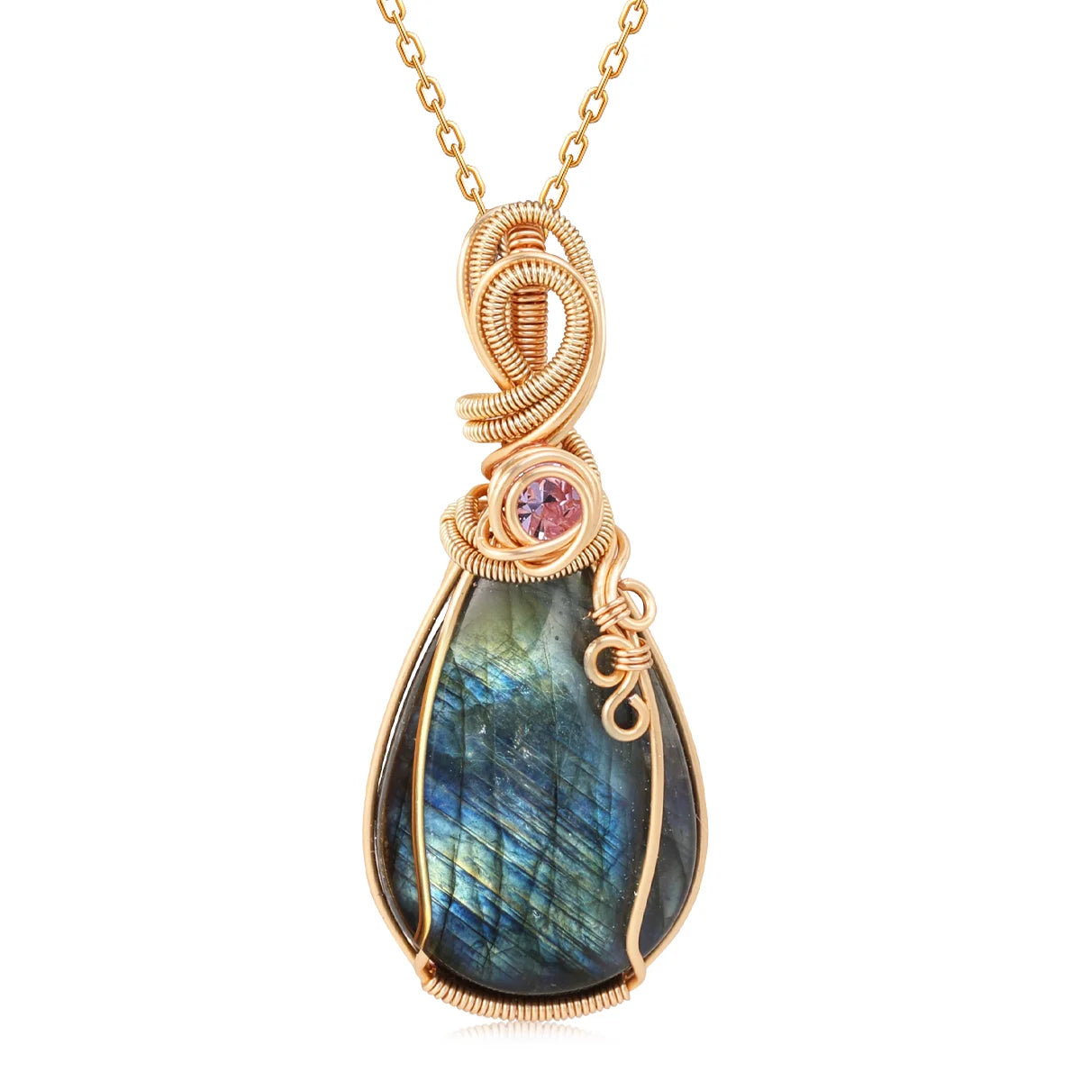 A teardrop-shaped labradorite pendant necklace in a gold wire wrap setting with a small round pink gemstone accent, shown on a white background.