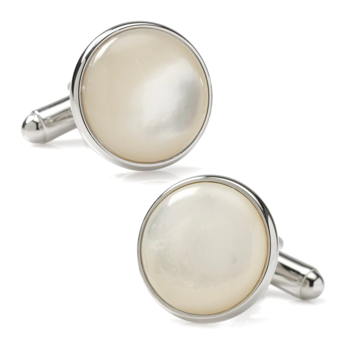 white cufflinks on white background