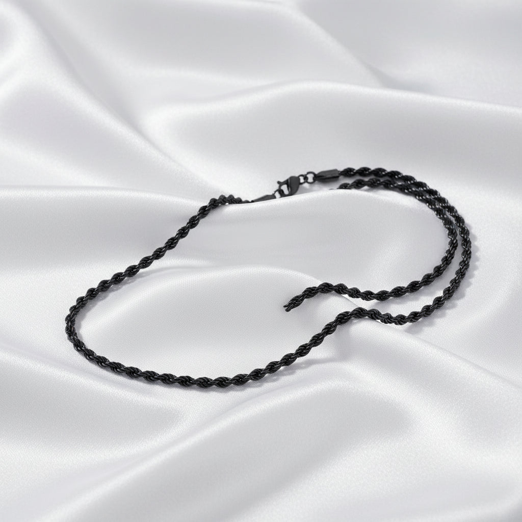 A black twisted rope chain necklace with a lobster clasp, shown against a plain white background.
