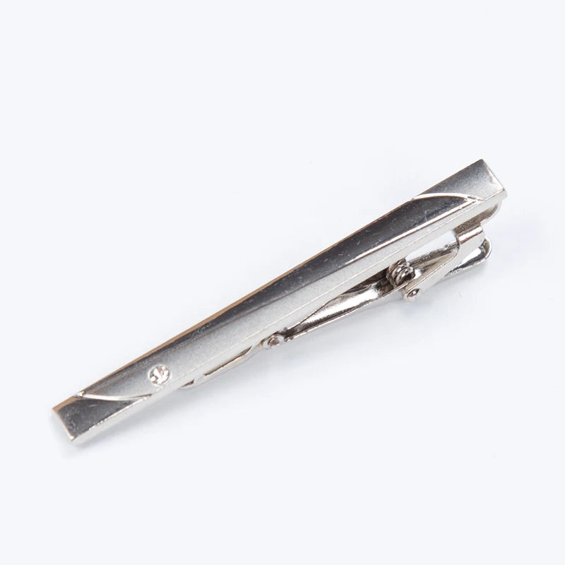 Silver tie clip on a white background