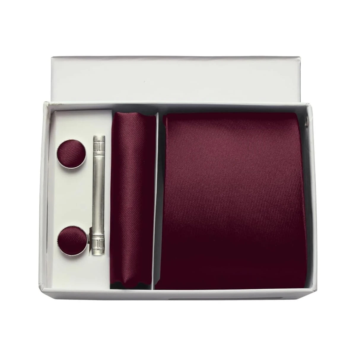 Burgundy tie set with cufflinks and silver clip in a box on a white background