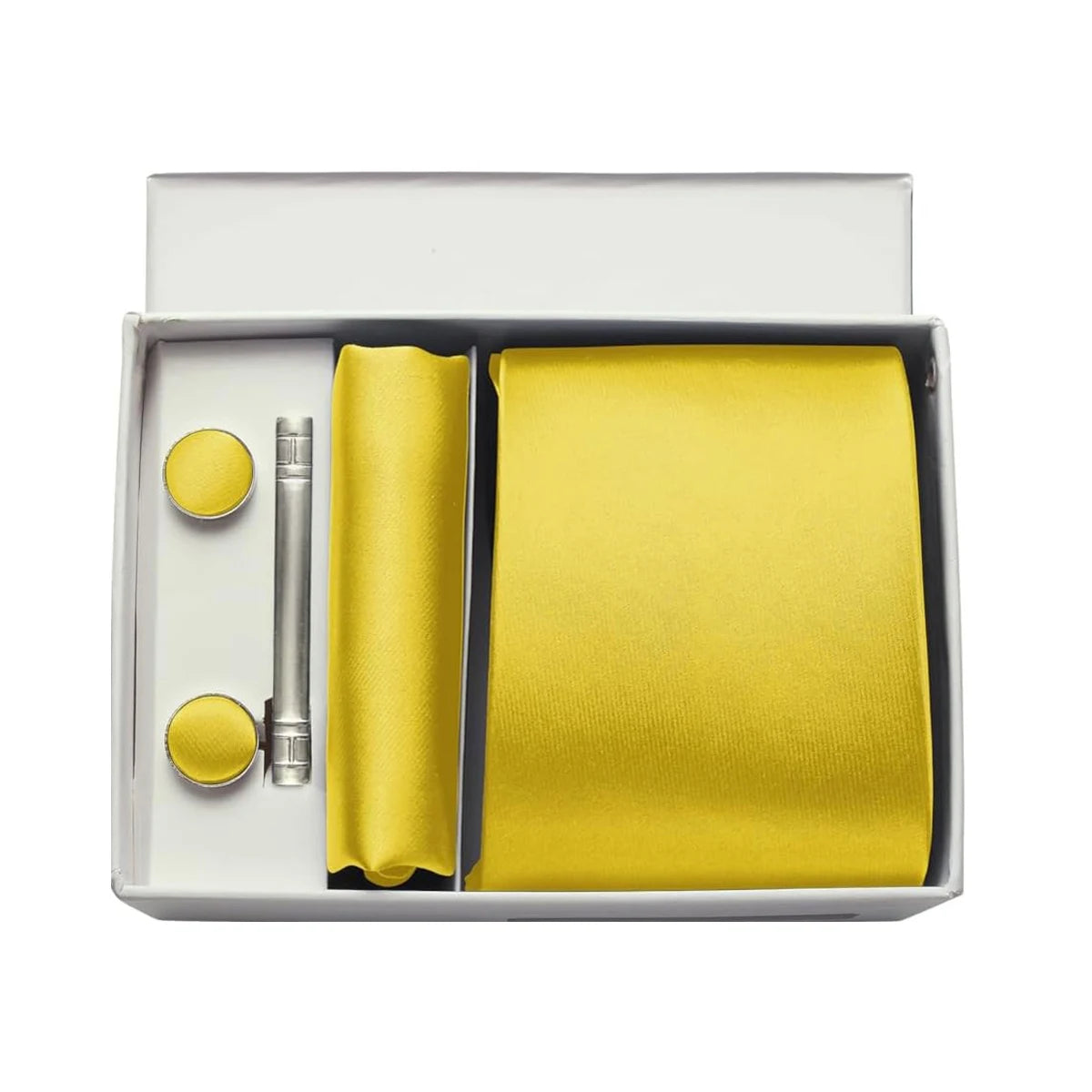 Yellow tie set with cufflinks and a silver clip in a box on a white background