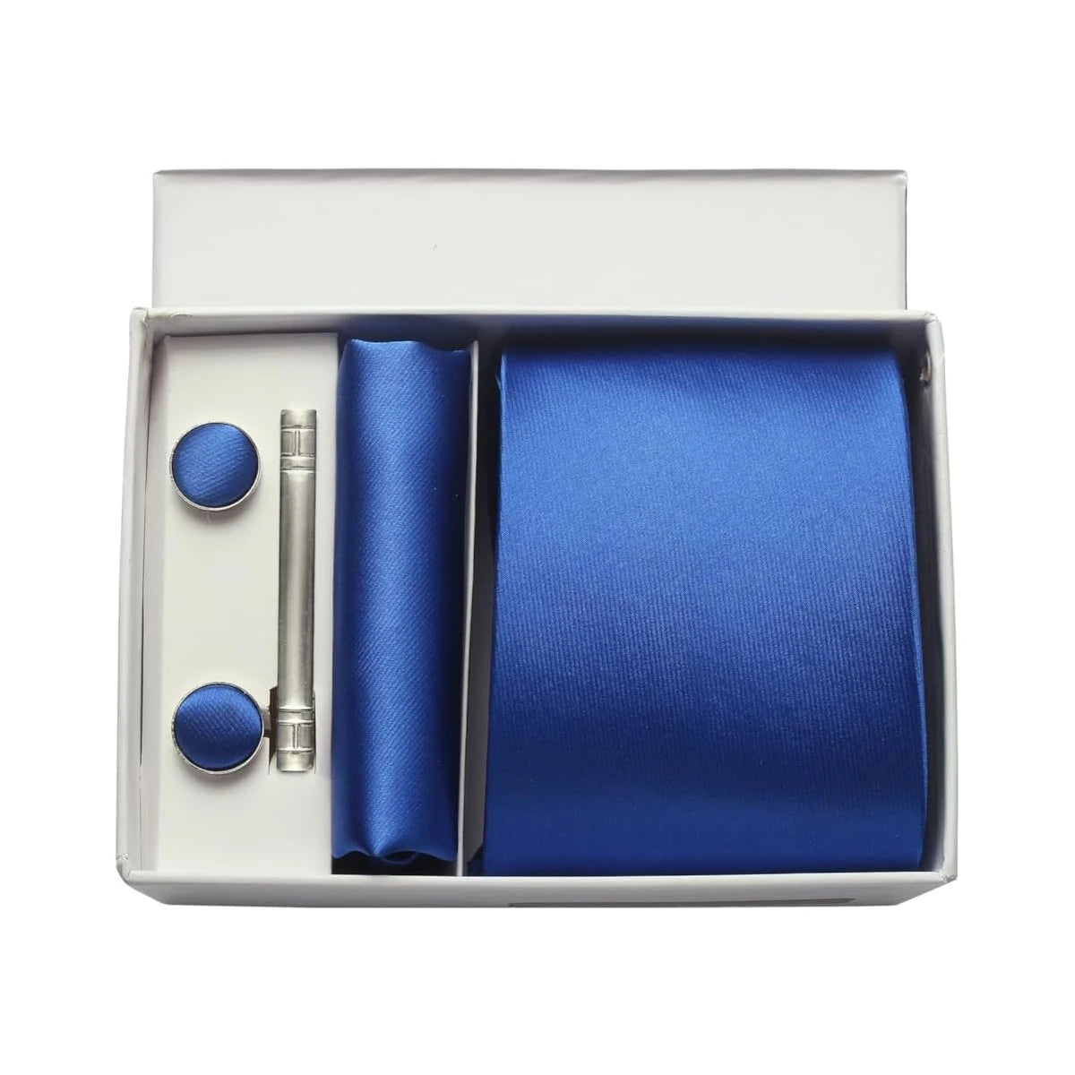 Blue tie, tie clip, and cufflinks set in a box on a white background