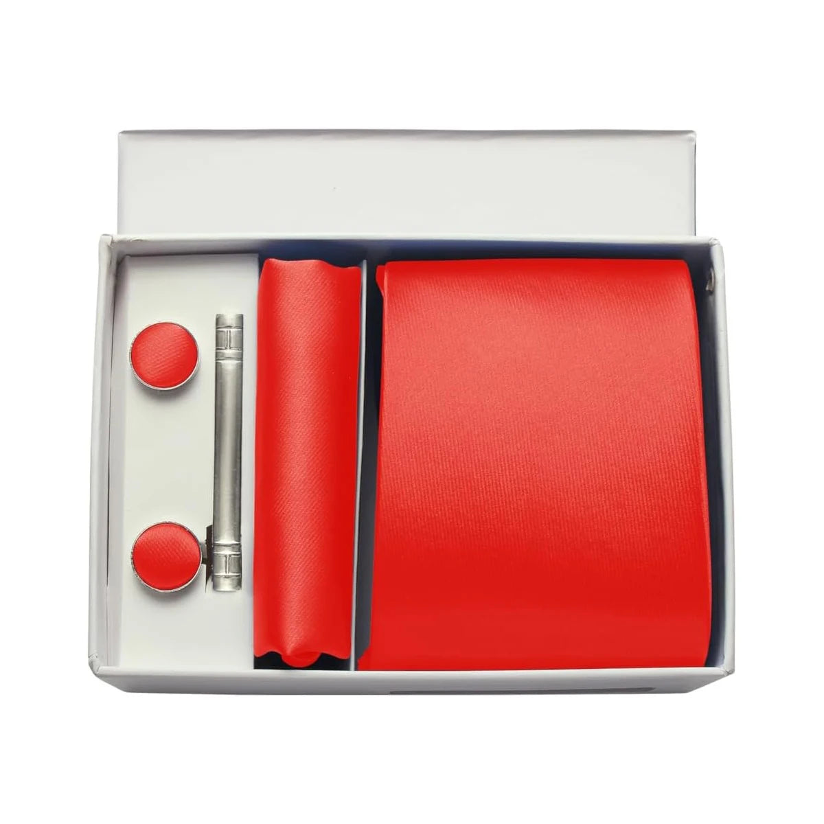 Red tie set with matching buttons and a silver tie clip in a box on a white background