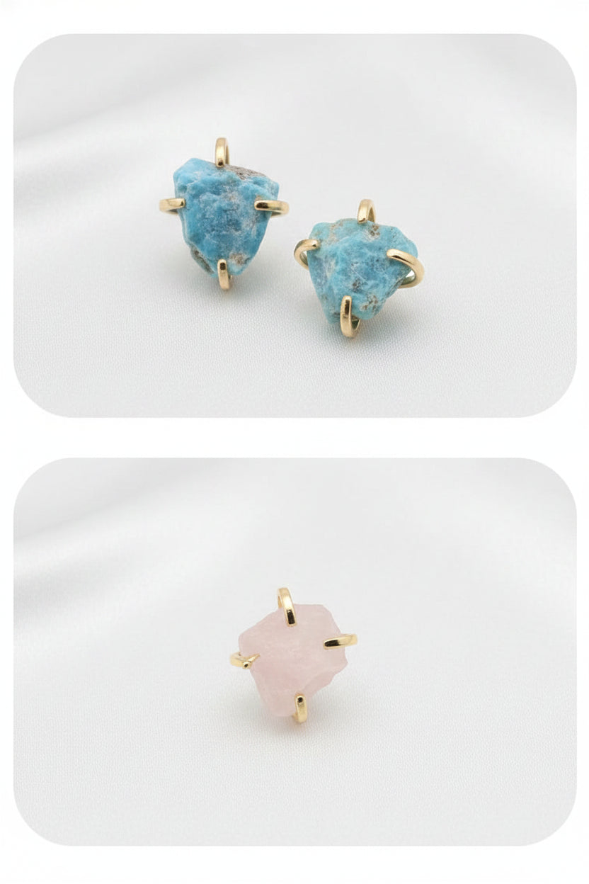  light blue stones resting on a against a white background.