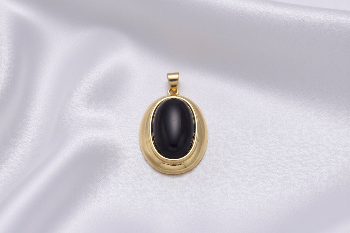 black stone gold setting with wite backgrounf